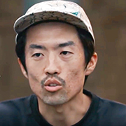 帽子を被った沼尾さんの顔写真