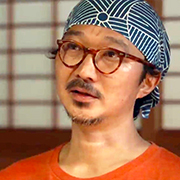 手拭いを頭に巻いている中山さんの顔写真